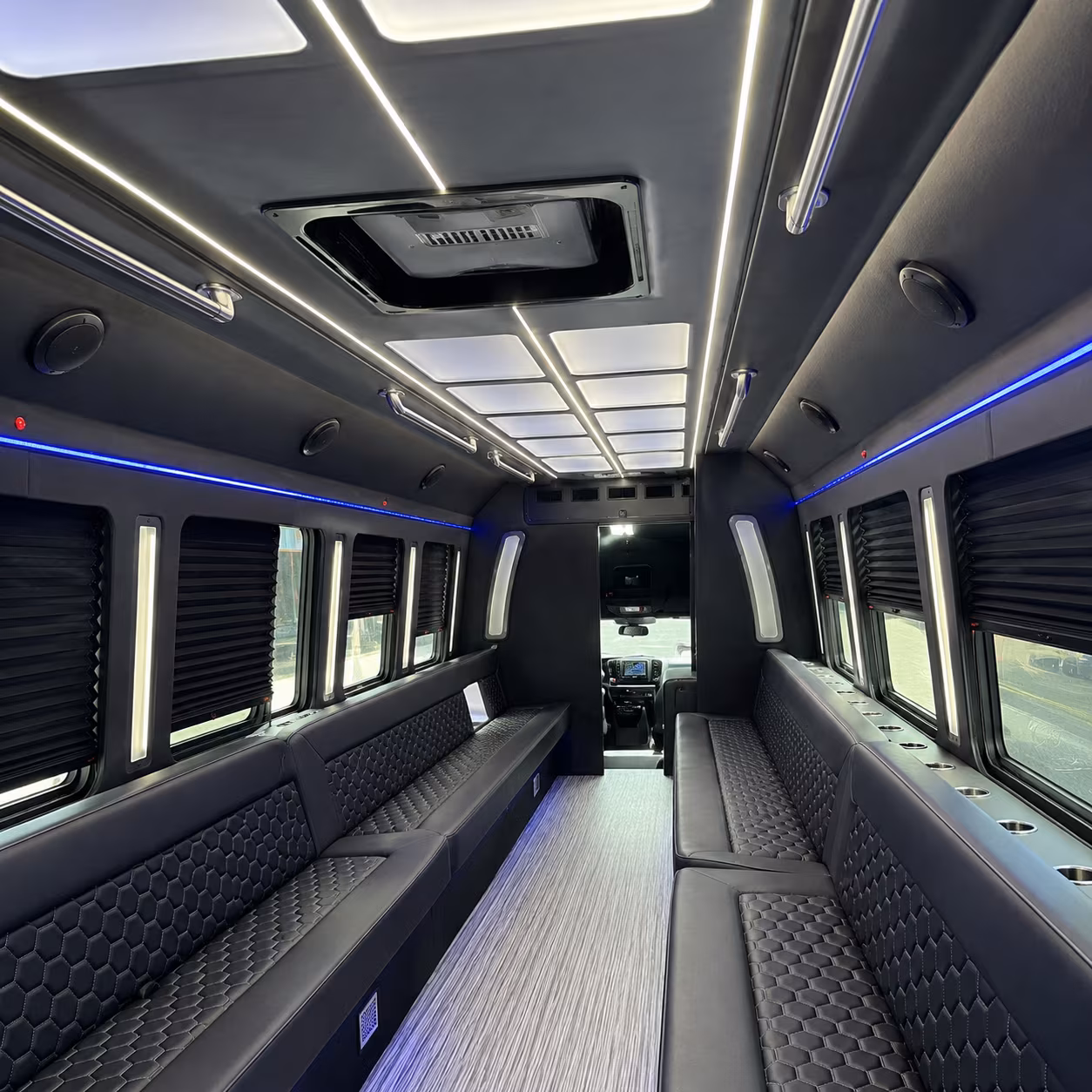 Wedding guests seated inside a party bus serving Detroit